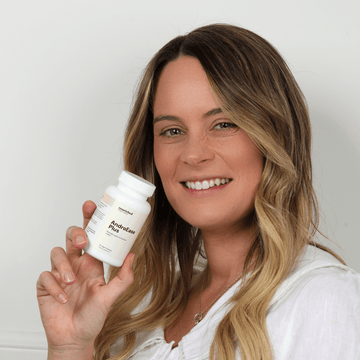 Founder Tam Woods holding AndroEase Plus — real results for PCOS acne, unwanted hair, and mood swings